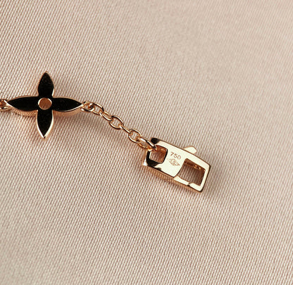 ミロ スターアンドサン 7モチーフ ゴールドブレスレット