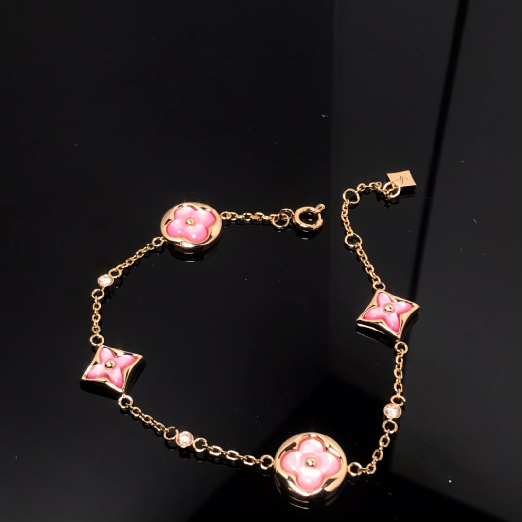 Miro STAR AND SUN 4 MOTIF PINK MOP PINK GOLD BRACELET
