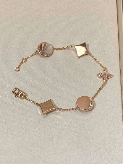 Miro STAR AND SUN 5 MOTIF MOP PINK GOLD BRACELET