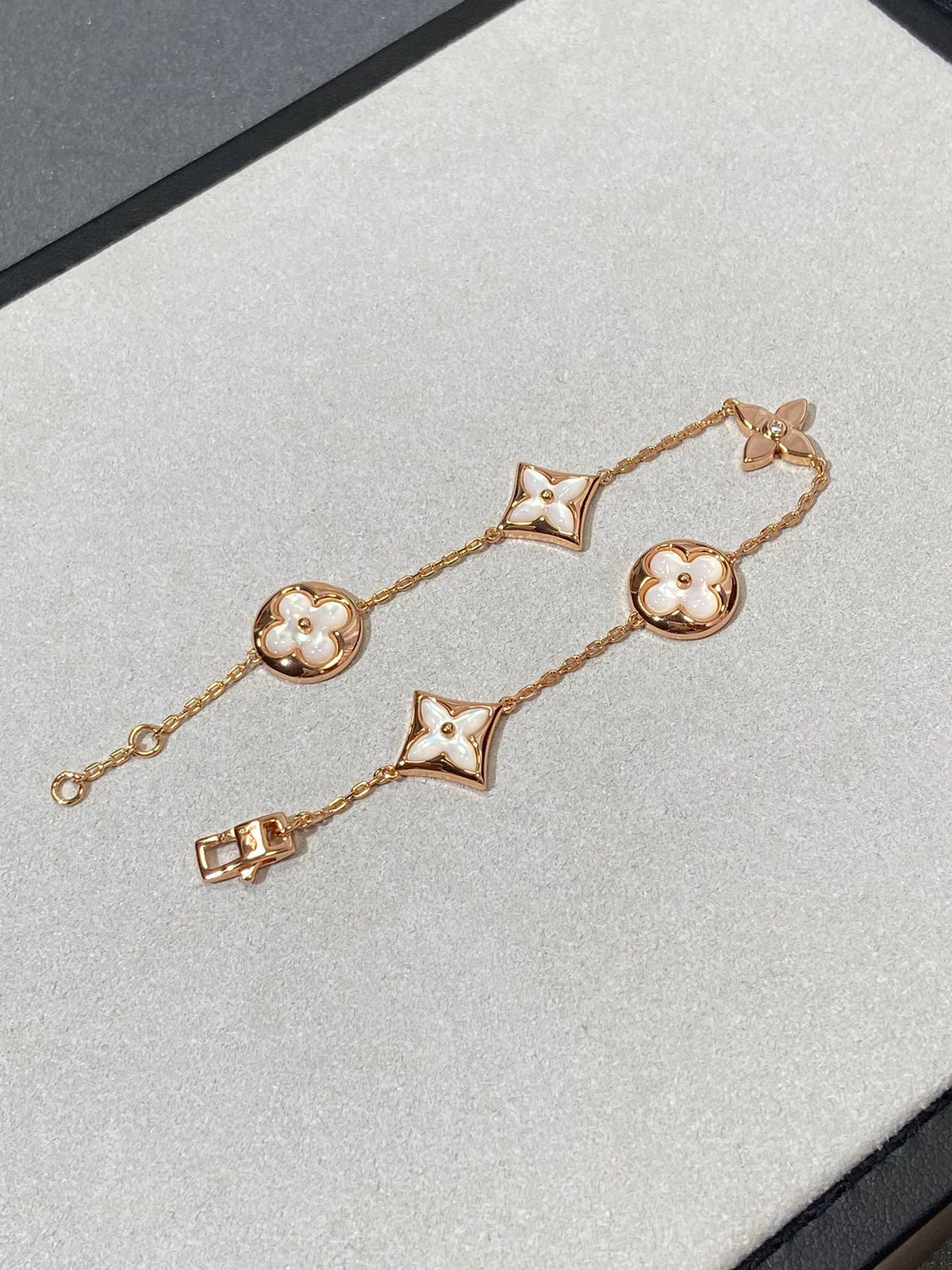 Miro STAR AND SUN 5 MOTIF MOP PINK GOLD BRACELET